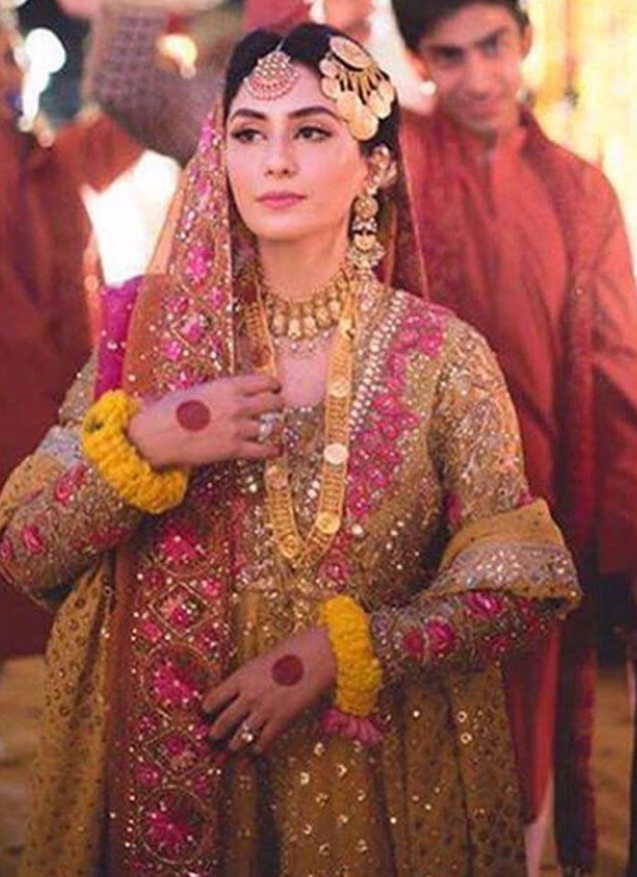 Absolutely beautiful Anushey in a saffron yellow and bougainvillea pink kalidaar Farah Talib Aziz Peshawas